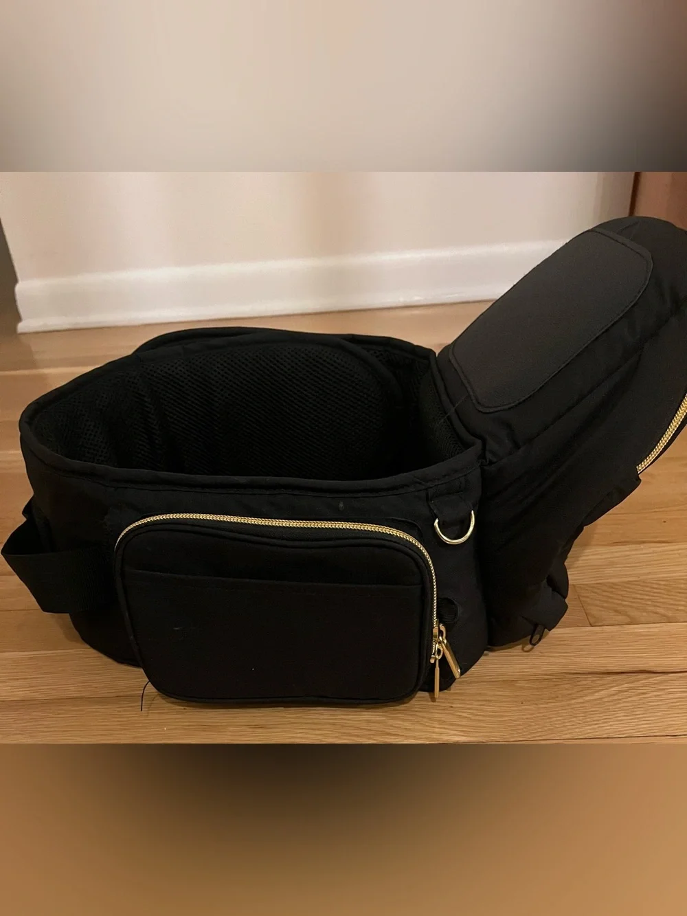 Black Tushbaby Baby Hip Bag with Gold Hardware